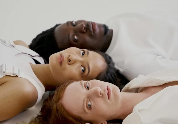 women-and-man-lying-on-white-surface-10211662